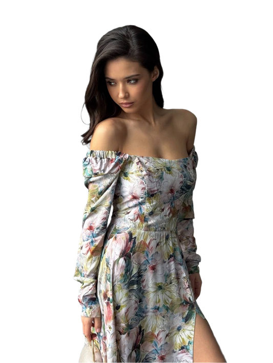 Woman wearing a floral off-shoulder dress on a white background