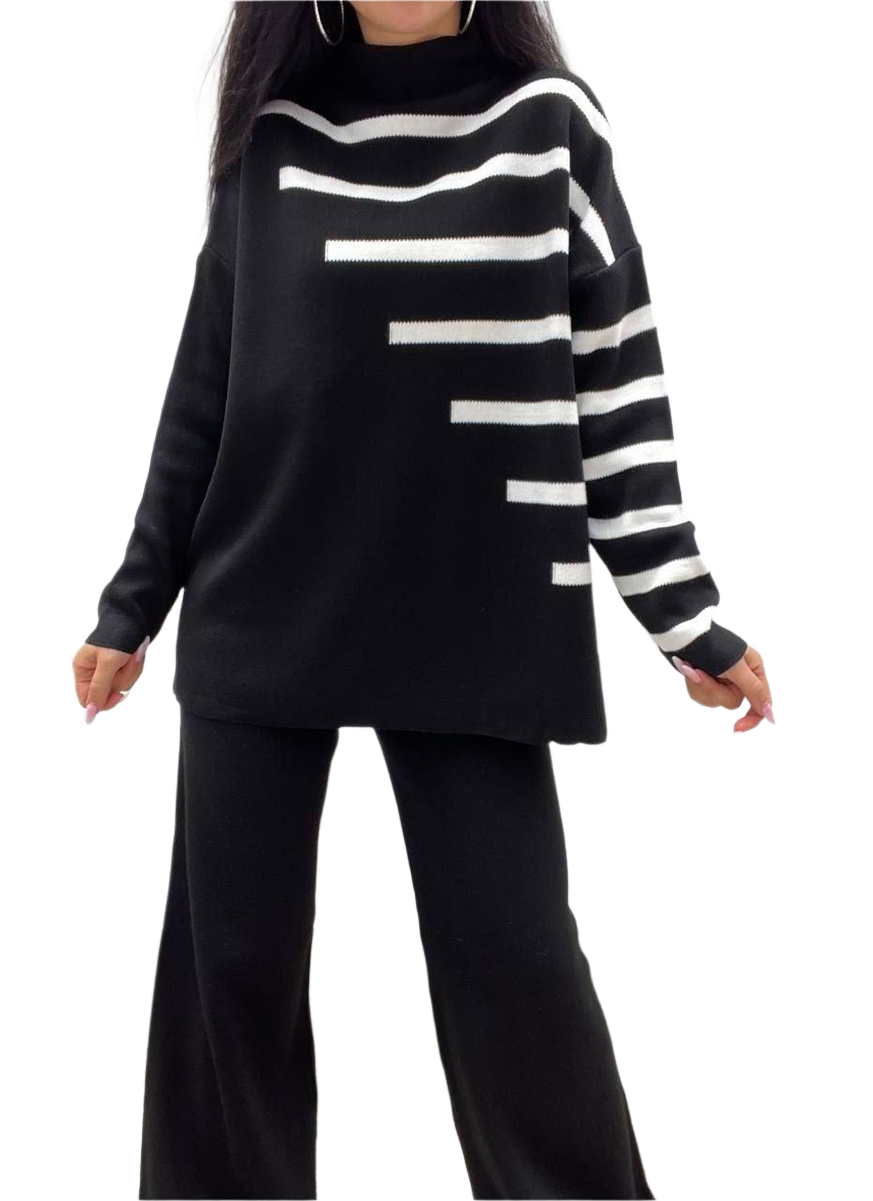 Black and white striped sweater worn by a person on a white background
