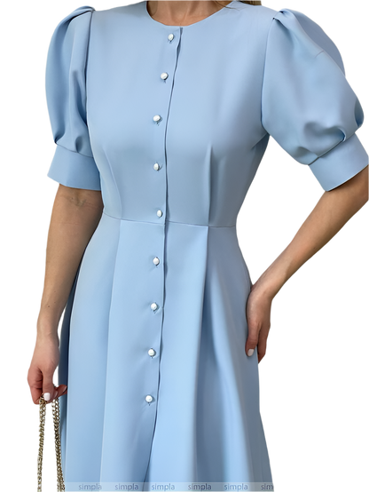 Light blue dress with puff sleeves on a white background