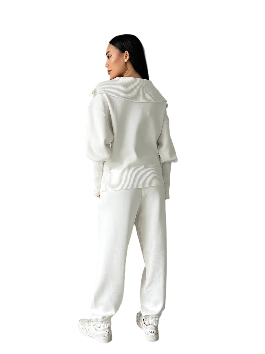 Person wearing a white outfit on a white background