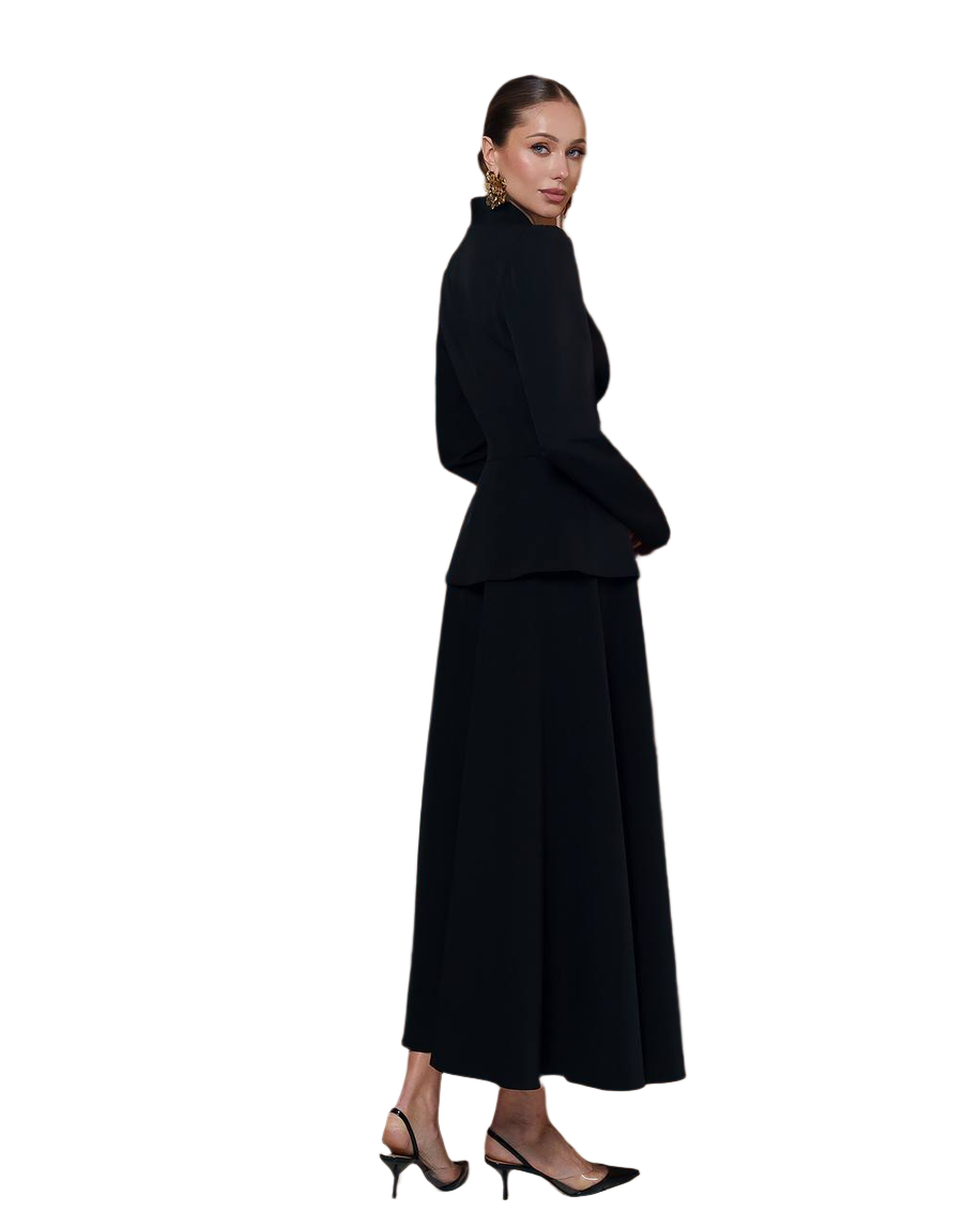 Woman wearing a black outfit on a white background