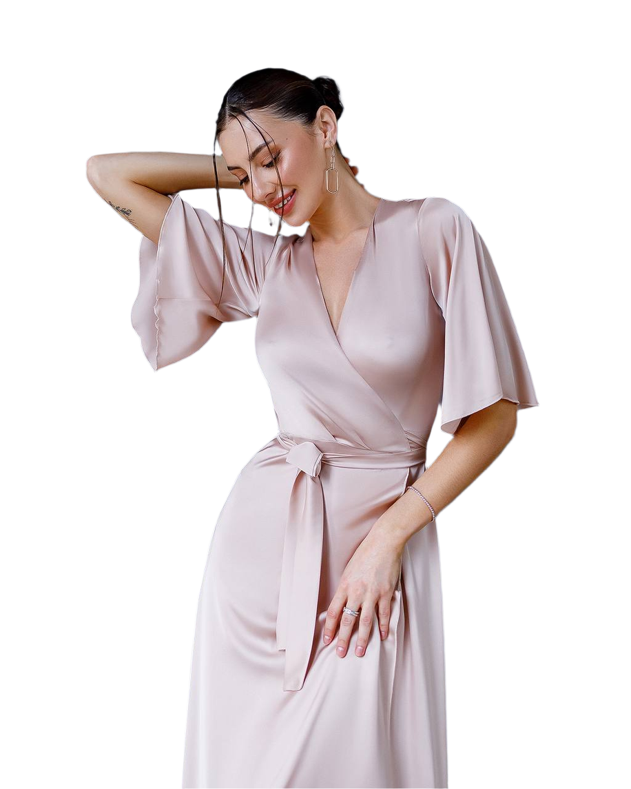 Woman wearing a light pink dress on a white background