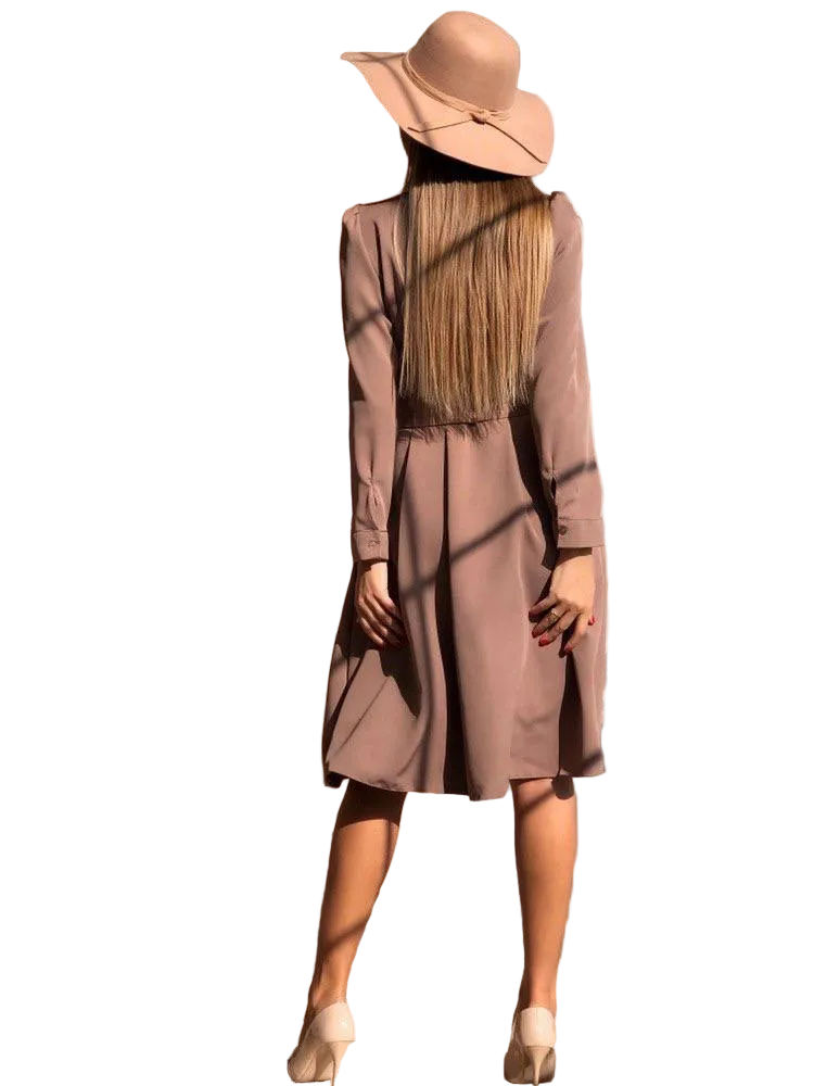 Person wearing a long-sleeve dress and wide-brimmed hat on a white background