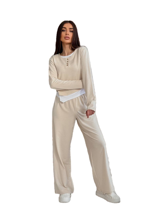 Woman wearing a beige loungewear set on a white background