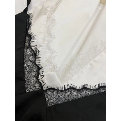 Elegant Black Slip Dress with Lace Details and Back Cutout