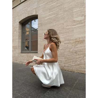 Elegant White Silk Slip Dress with Lace Detail and Back Cutout