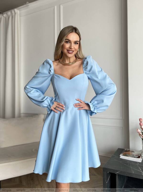 Elegant Light Blue Fitted Dress with Flared Skirt