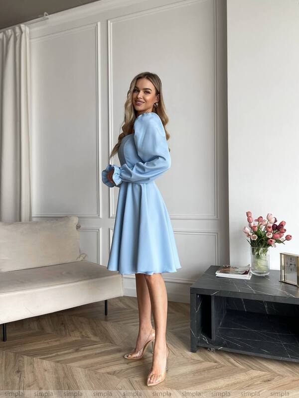 Elegant Light Blue Fitted Dress with Flared Skirt
