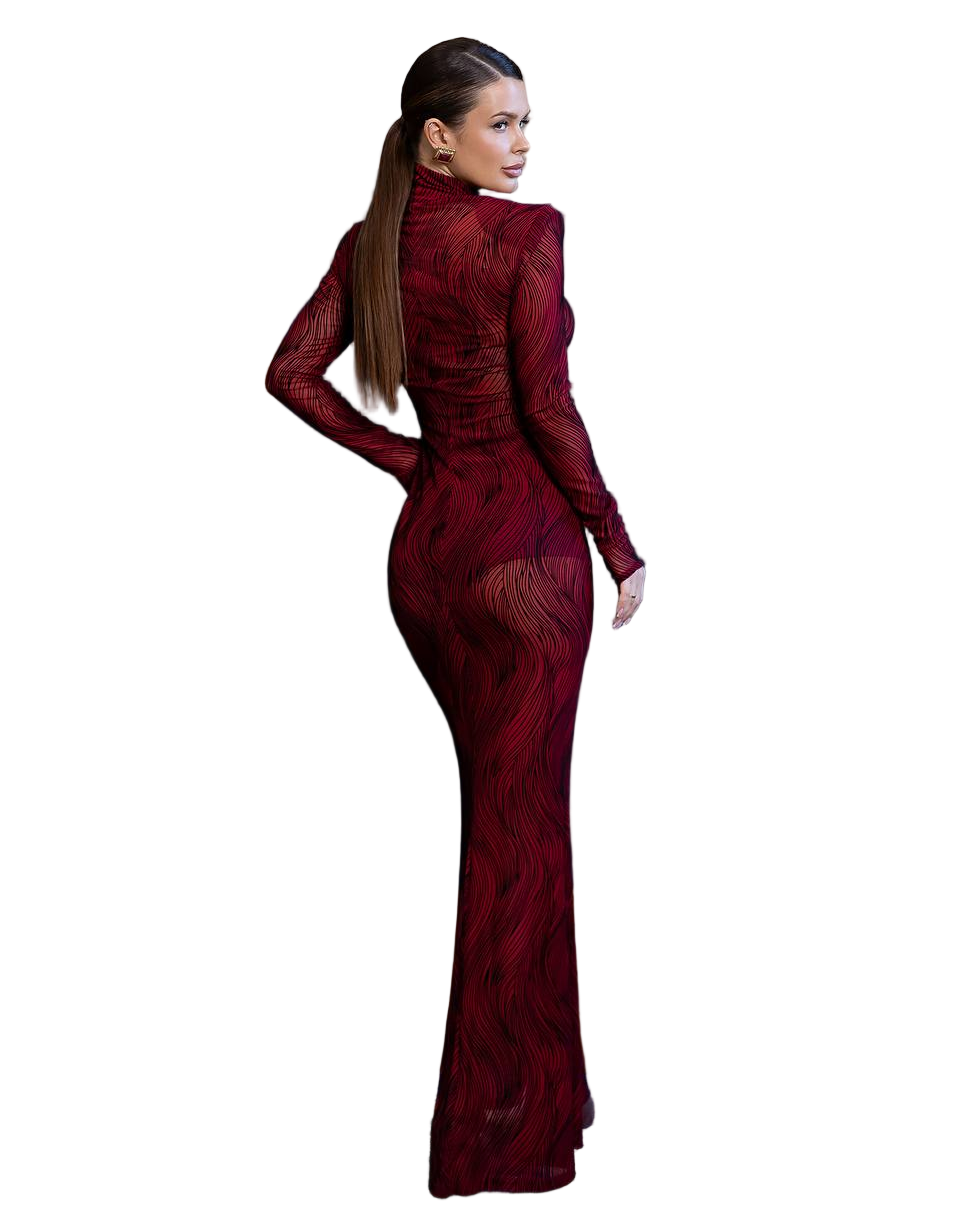 Woman wearing a burgundy evening gown on a white background