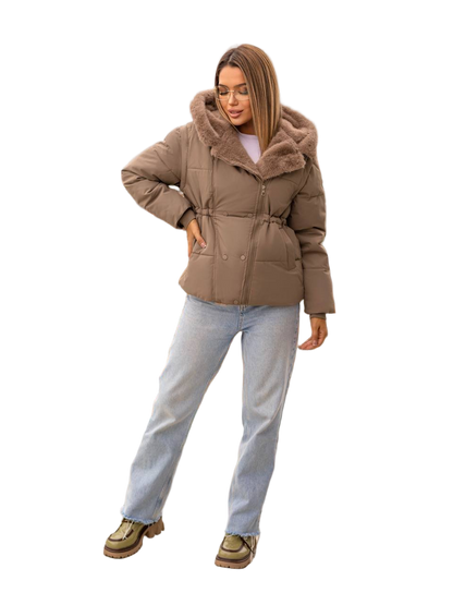 Woman wearing a brown puffer jacket with fur hood on a white background