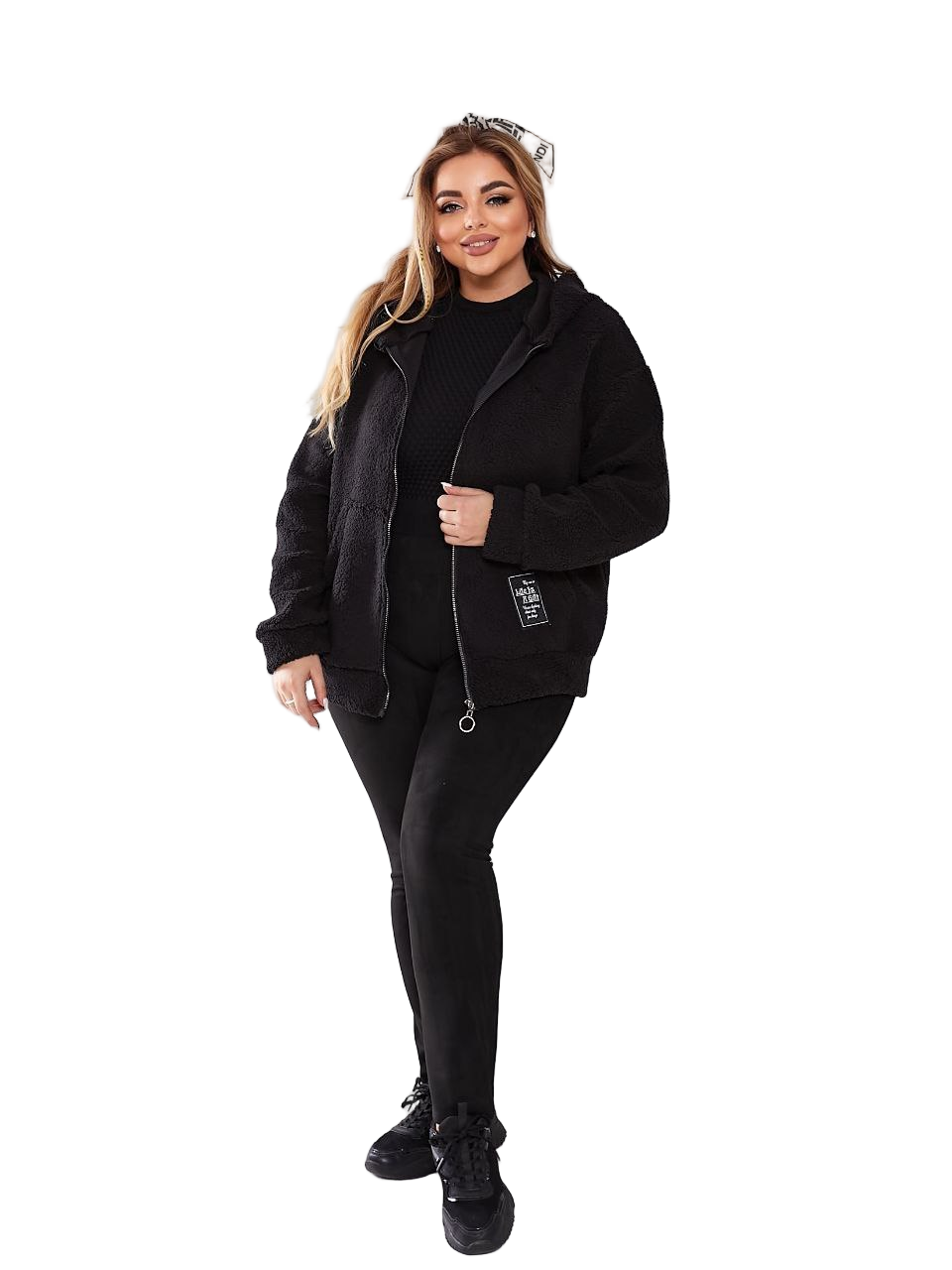 Woman wearing a black outfit on a white background