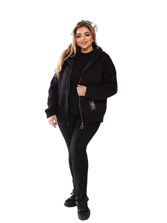 Woman wearing a black outfit on a white background